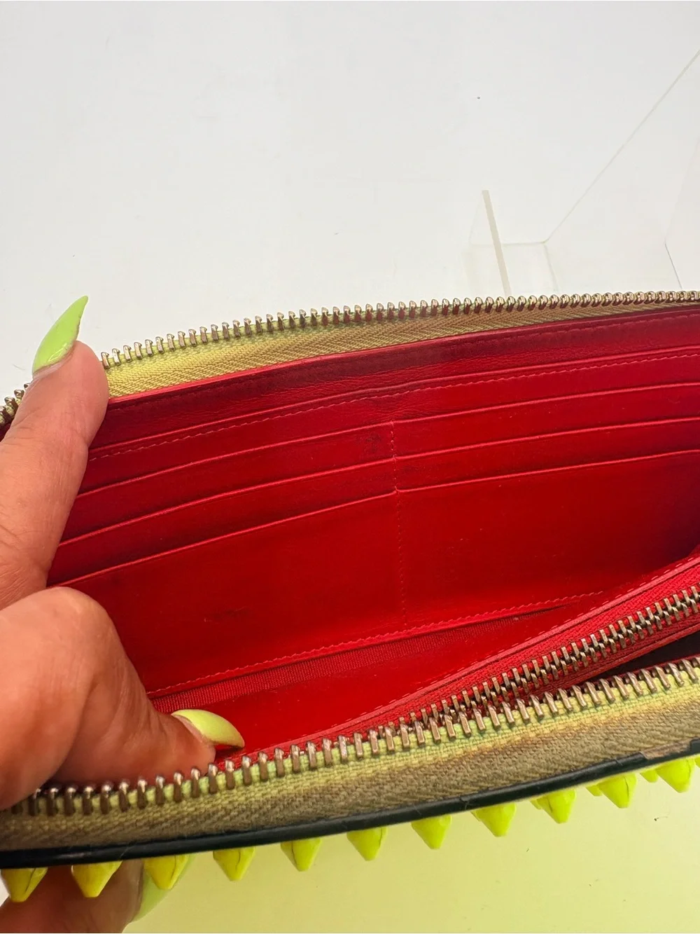 Christian Louboutin neon wallet